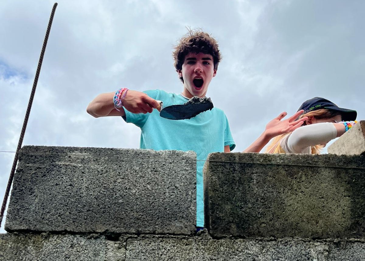 Students zip-lining through a Costa Rican rainforest